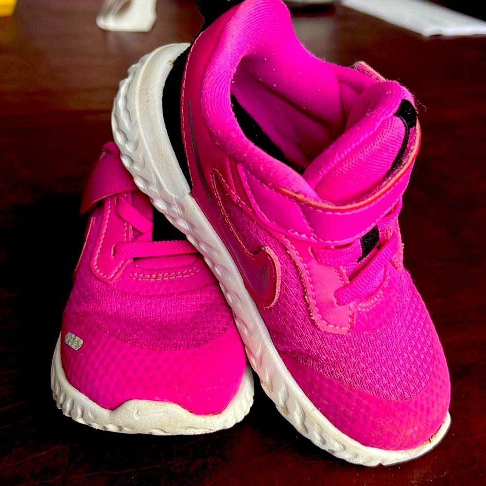 Nike pink shoes.